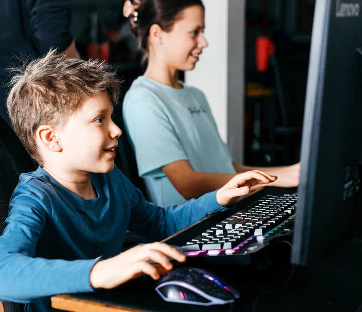 Students working together at computers
